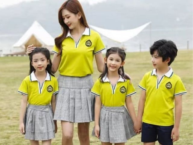 Mẫu áo thun đồng phục màu vàng phối bo cổ màu trắng